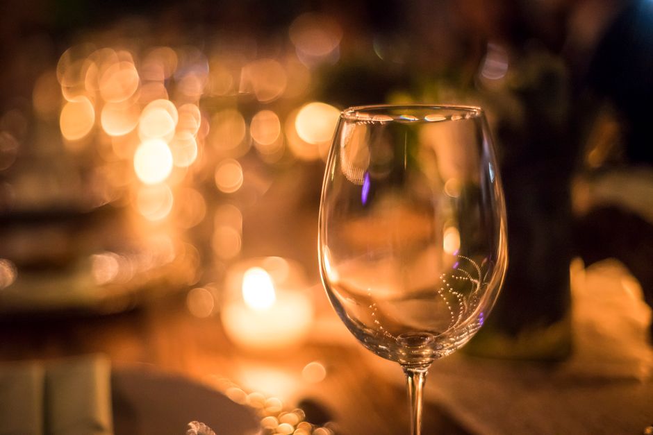 Fine dining table setting with sophisticated wine pairing and restaurant celebration